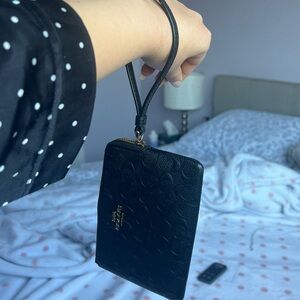 Coach wristlet black embossed